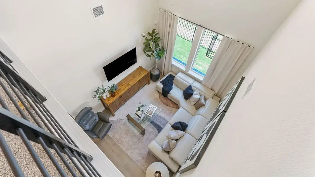 Furnished interior in a model home at Mustang Square in Plano (Image 13).