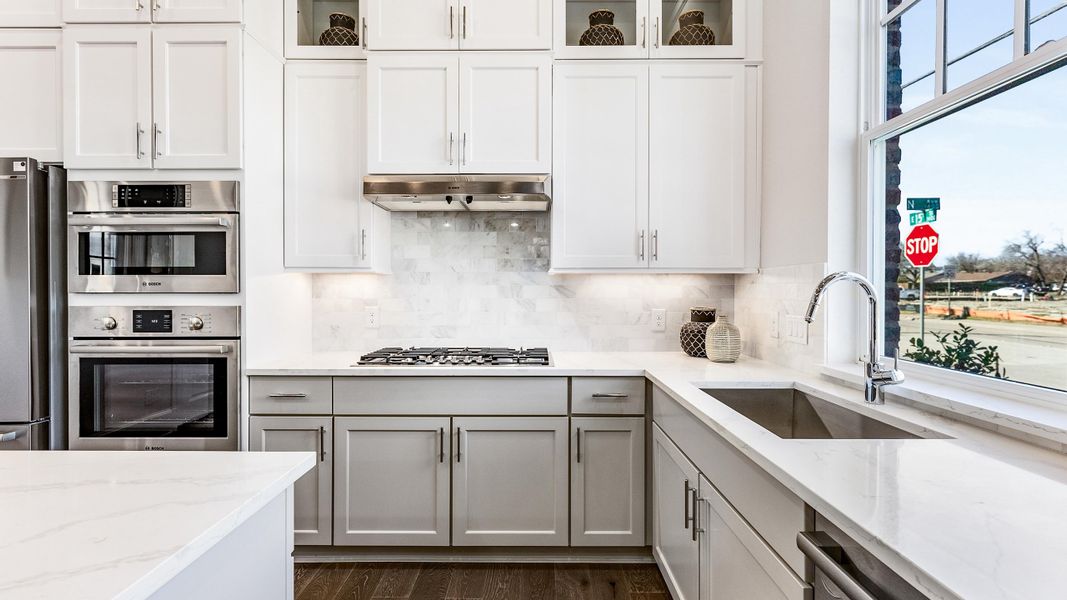 Furnished interior in a model home at 1897 Townhomes in Plano (Image 7).