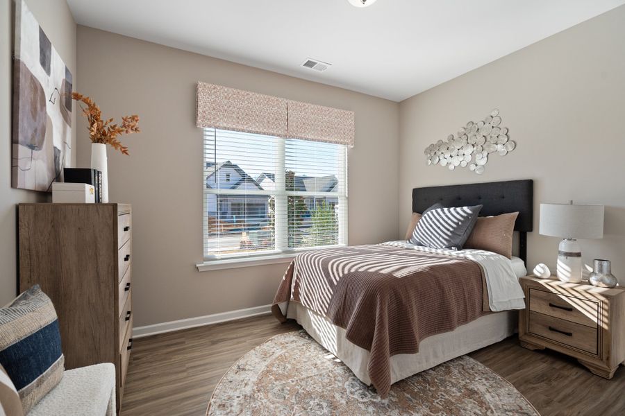 Furnished interior in a model home at Vandiver Creek in South Fulton (Image 5).