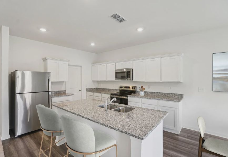 Furnished interior in a model home at Ashland in Angleton (Image 3).