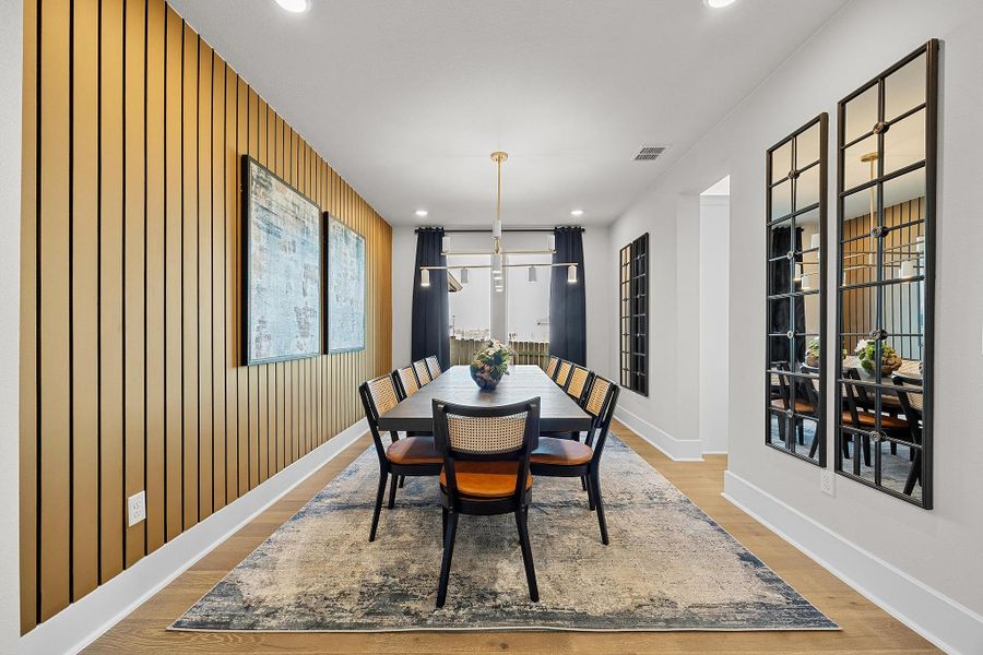 Furnished interior in a model home at New Haven - 60' in Manor (Image 3).