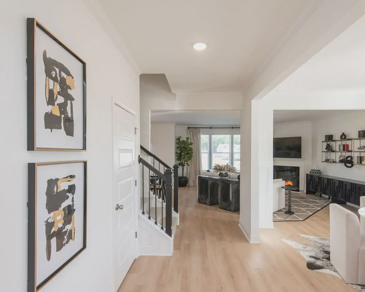 Furnished interior in a model home at Clark Farms in Flowery Branch (Image 4).