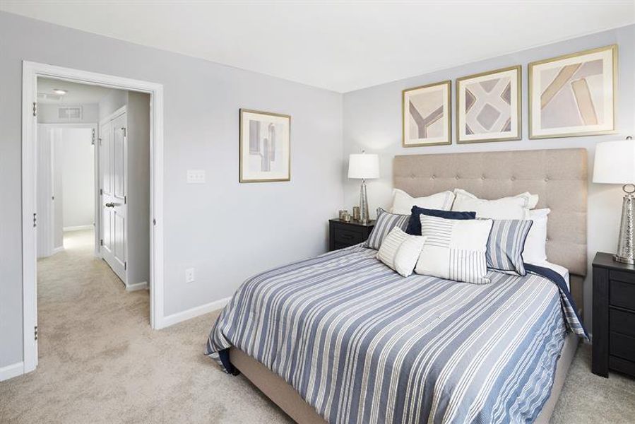 Furnished interior in a model home at South Mills Towns in South Mills (Image 9).
