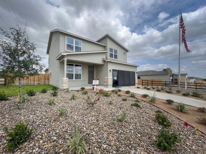 Front exterior of a home in the Villas San Agustin community, located in Laredo, TX (Image 7).