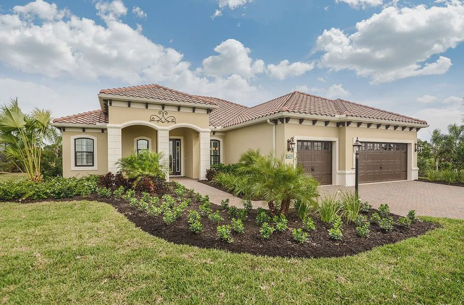 Front exterior of a home in the Boca Royale Golf and Country Club at Wellen Park community, located in Englewood, FL (Image 5).