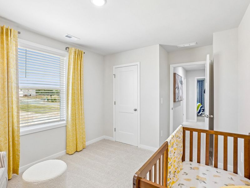 Furnished interior in a model home at Cadence Meadows in Zebulon (Image 24).