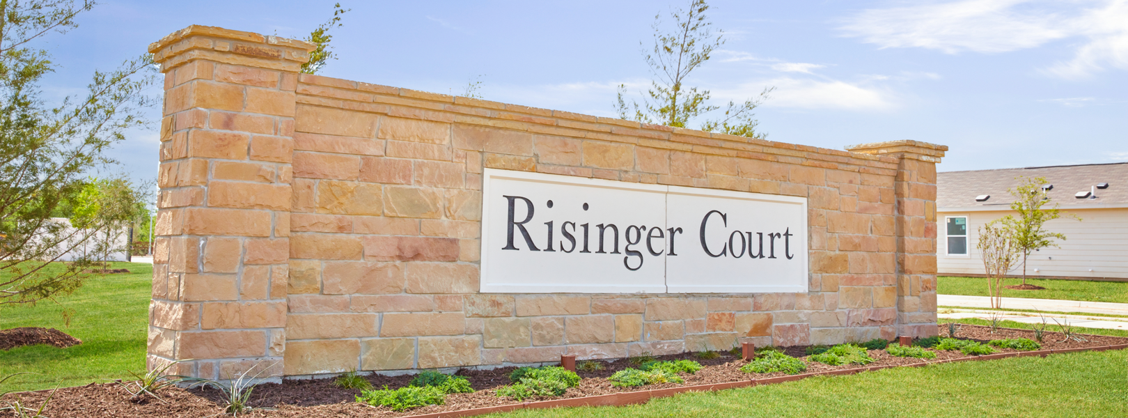 Entrance to the Risinger Court community in Fort Worth, TX, featuring signage and landscaping (Image 1).