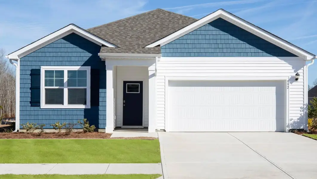 Front exterior of a home in the Halls Landing community, located in Bolivia, NC (Image 1). Front exterior of a home in the Halls Landing community, located in Bolivia, NC (Image 1).