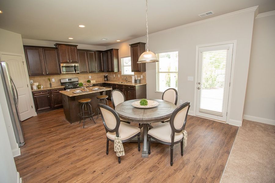 Furnished interior in a model home at River’s Station in Atlanta (Image 5).