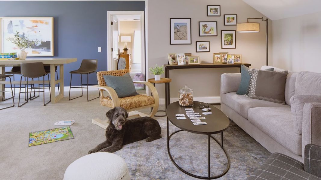 Furnished interior in a model home at The Courtyards at Holly Grove in Holly Springs (Image 14).