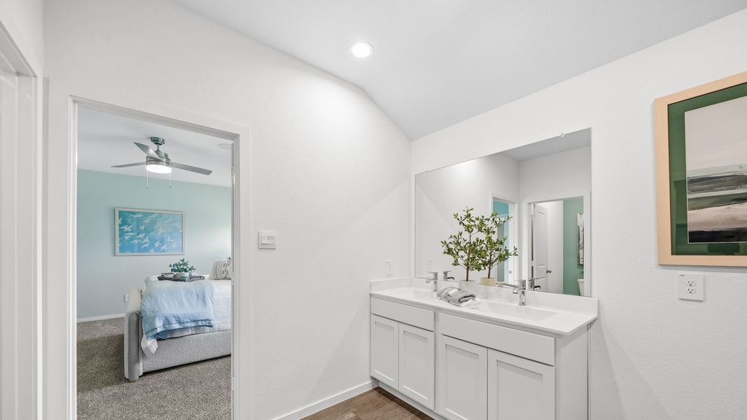 Furnished interior in a model home at Sunterra in Katy (Image 39).