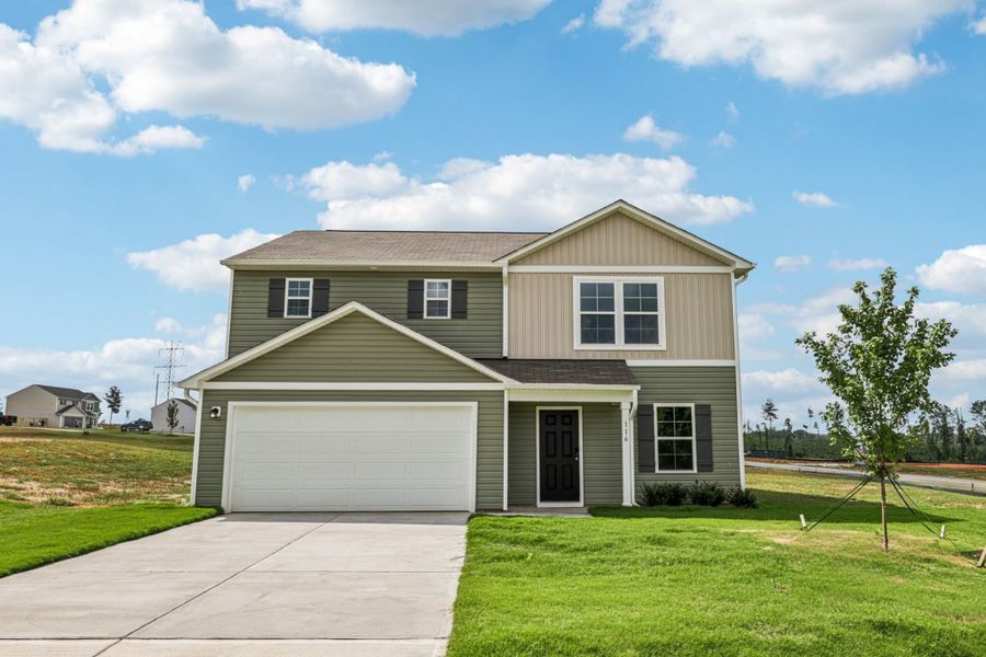 A house with a garage. A house with a garage.