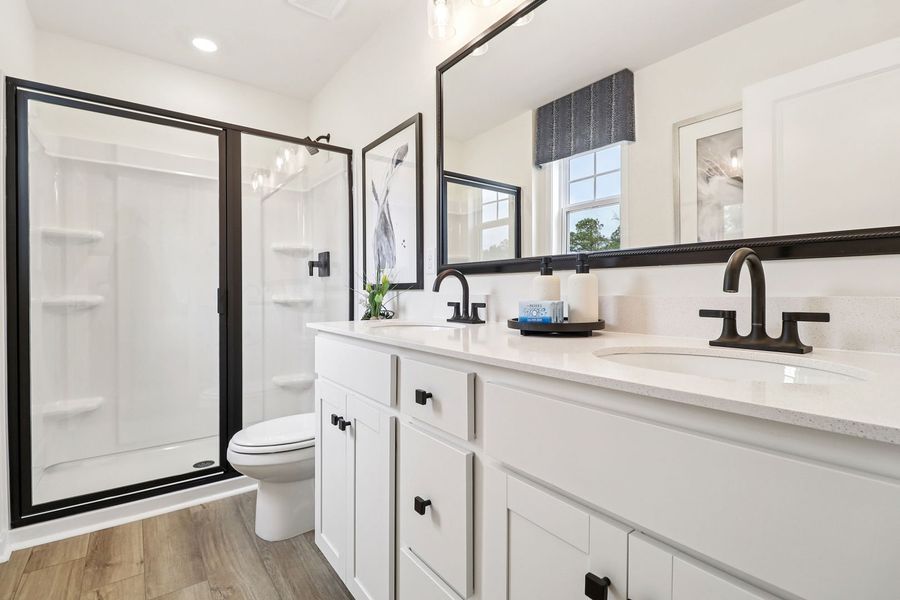 Get ready with ease thanks to dual sinks and ample storage