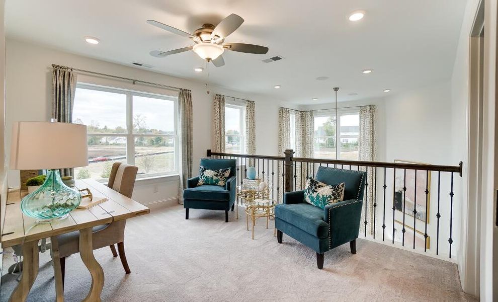 Furnished interior in a model home at Johnston Park Townhomes in Charlotte (Image 15). Furnished interior in a model home at Johnston Park Townhomes in Charlotte (Image 15).