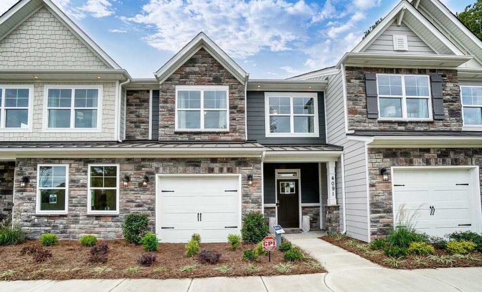 Front exterior of a home in the Running Brook Townes community, located in Durham, NC (Image 1). Front exterior of a home in the Running Brook Townes community, located in Durham, NC (Image 1).