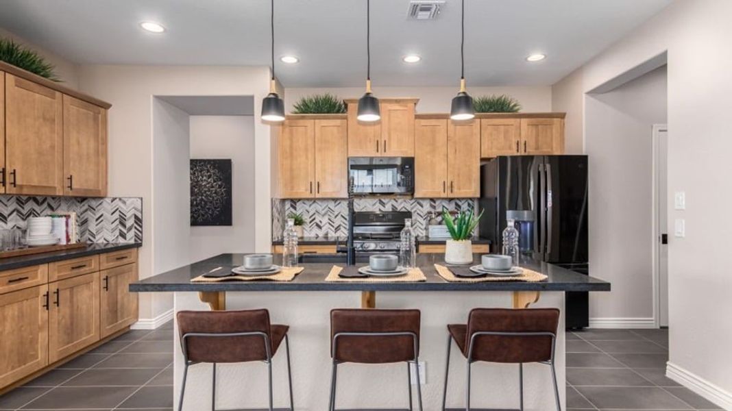 Furnished interior in a model home at Alamar Encore Collection in Avondale (Image 11).