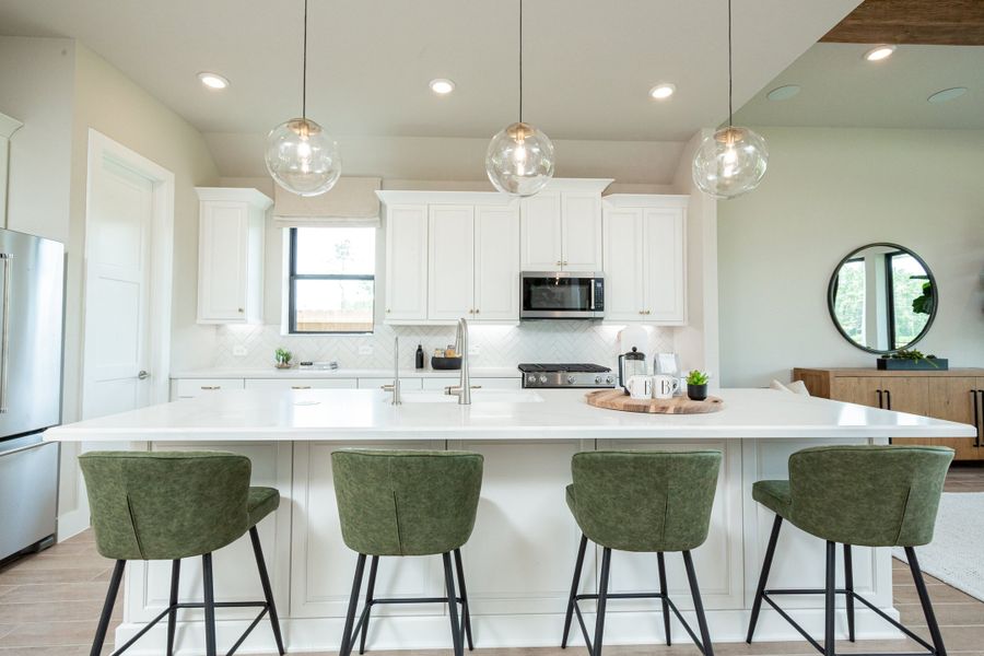 Furnished interior in a model home at The Highlands in Porter (Image 7).