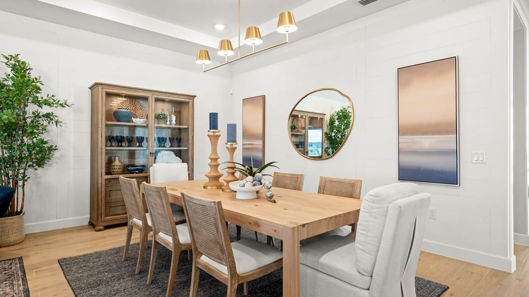 Furnished interior in a model home at Esplanade by the Islands in Naples (Image 43).