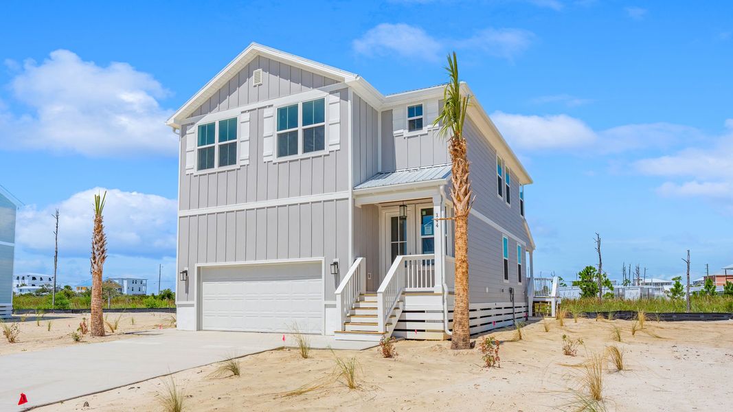 Front exterior of a home in the Redfish Cove at Cape San Blas community, located in Port Saint Joe, FL (Image 1).