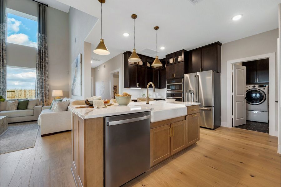 Furnished interior in a model home at Sunterra Lakes in Brookshire (Image 23).
