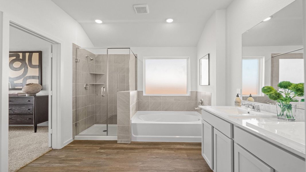 Furnished interior in a model home at Sunterra Lakes in Brookshire (Image 24).