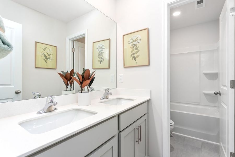 Furnished interior in a model home at Cedar Oaks in Greensboro (Image 21).