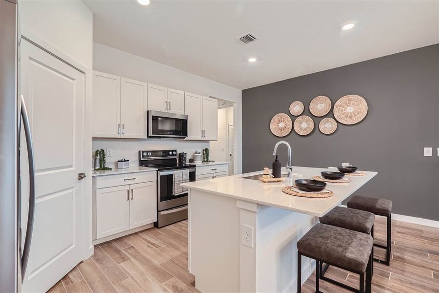Furnished interior in a model home at Willow Pointe in Stuart (Image 27).