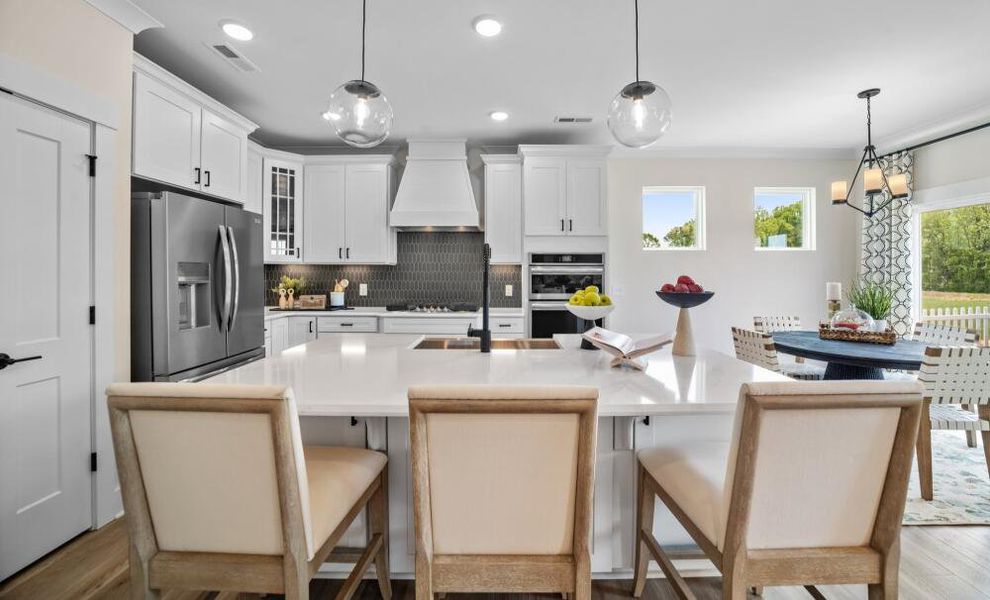 Furnished interior in a model home at Monterra in Kernersville (Image 7).