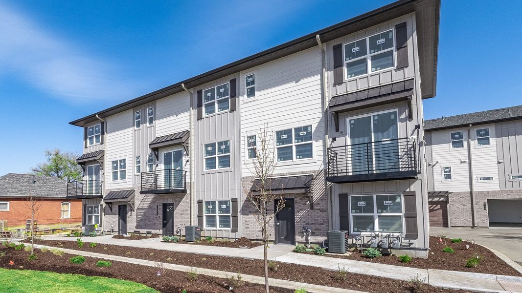 Front exterior of a home in the Parkside Arvada community, located in Arvada, CO (Image 1).
