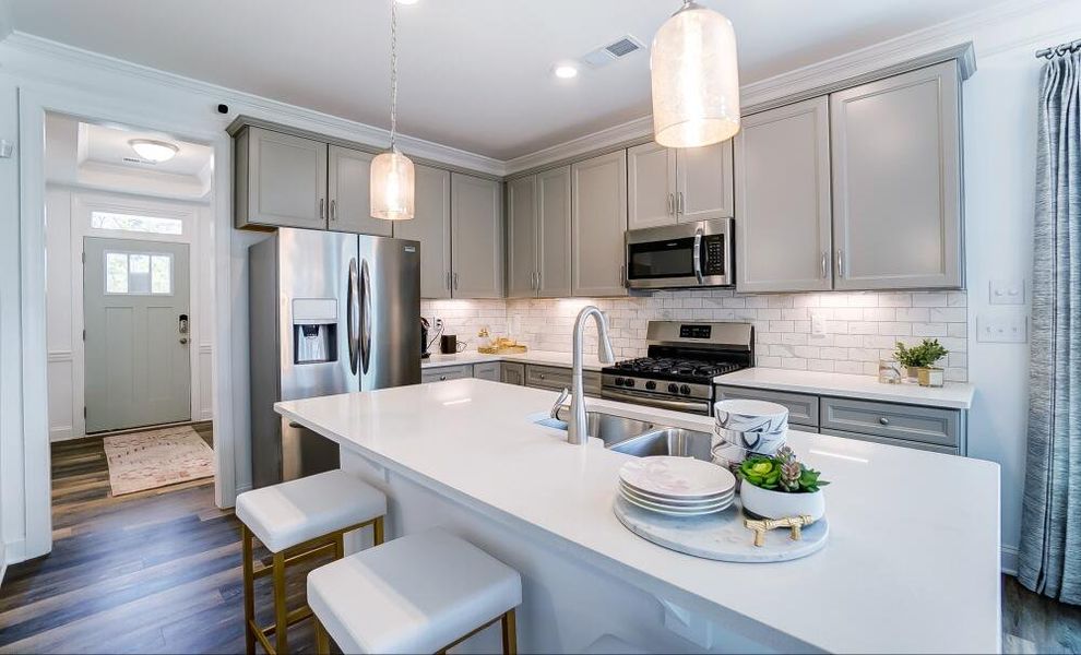 Furnished interior in a model home at Pineview Glen Townhomes in Durham (Image 3). Furnished interior in a model home at Pineview Glen Townhomes in Durham (Image 3).