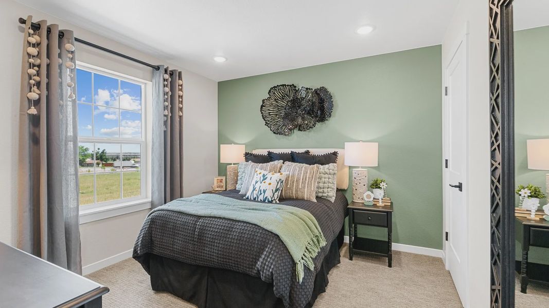 Elegant bedroom features a chic green accent wall and designer decor. Abundant natural light enhances the Timnath Lakes ambiance. Elegant bedroom features a chic green accent wall and designer decor. Abundant natural light enhances the Timnath Lakes ambiance.