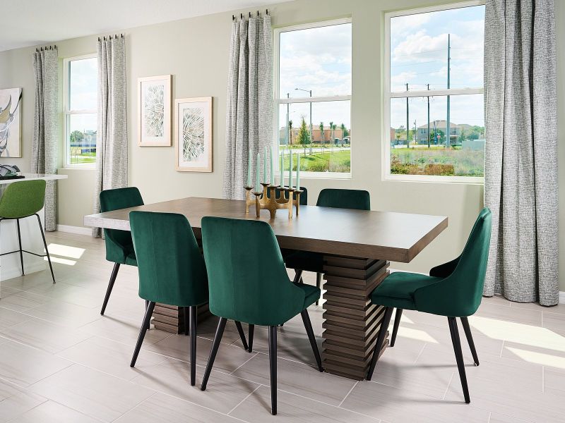Dining room in the Acadia floorplan at a Meritage Homes community.