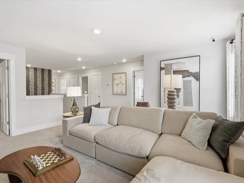 Furnished interior in a model home at Crossing at Abner Creek in Greer (Image 10).