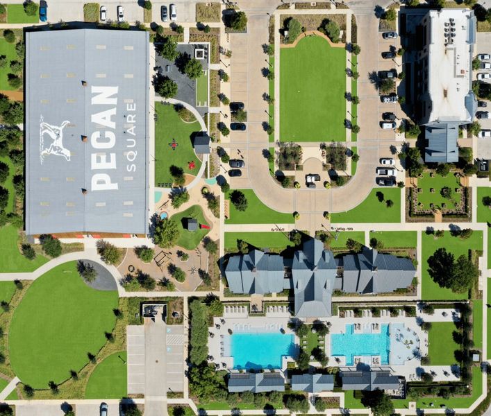 Aerial view of the Pecan Square community in Northlake, TX, showing layout and nearby surroundings (Image 9). Aerial view of the Pecan Square community in Northlake, TX, showing layout and nearby surroundings (Image 9).