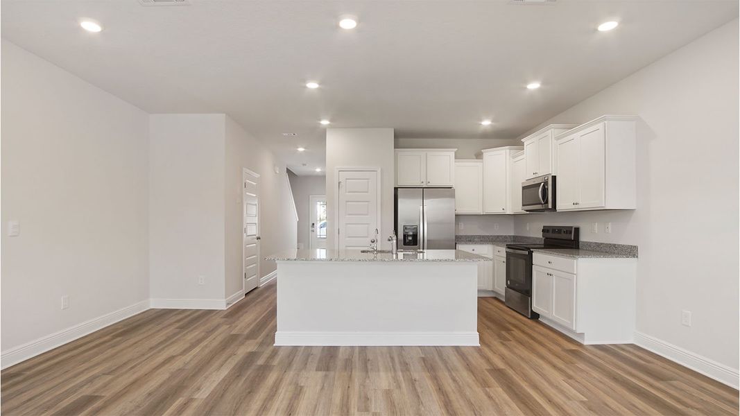 Furnished interior in a model home at Caballeros Estates Townhomes at Hombre in Panama City Beach (Image 12).
