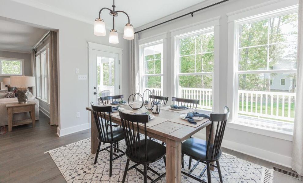 Furnished interior in a model home at Peyton's Creek in Statesville (Image 16).