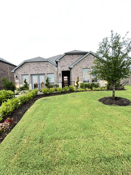 A charming brick home with landscaped yard in Madera by D.R. Horton, Royse City, TX. A charming brick home with landscaped yard in Madera by D.R. Horton, Royse City, TX.