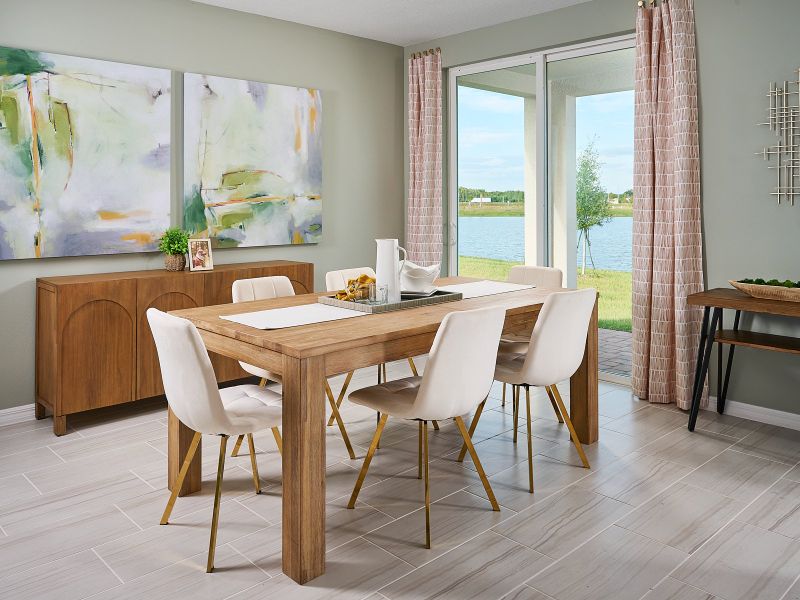 Dining room in the Foxglove plan modeled at The Meadow at Crossprairie