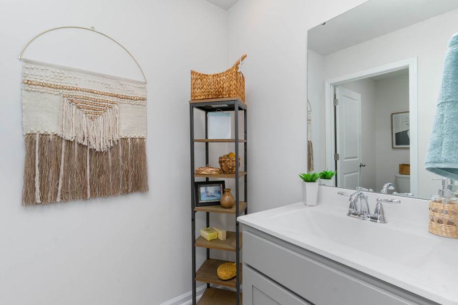 Furnished interior in a model home at Island Green in Myrtle Beach (Image 45).