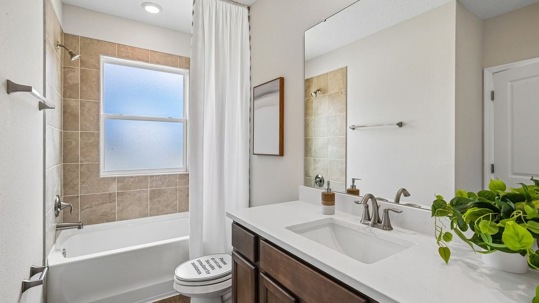 Furnished interior in a model home at Sanctuary at Citrus Park Townhomes in Tampa (Image 24).