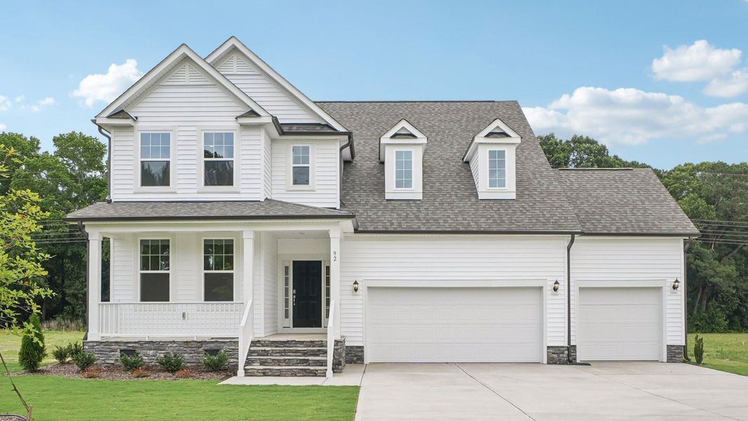 Front exterior of a home in the Blake Pond community, located in Lillington, NC (Image 11). Front exterior of a home in the Blake Pond community, located in Lillington, NC (Image 11).