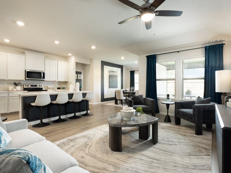 Living, dining room, and kitchen in the Callaghan floorplan at a Meritage Homes community. Living, dining room, and kitchen in the Callaghan floorplan at a Meritage Homes community.
