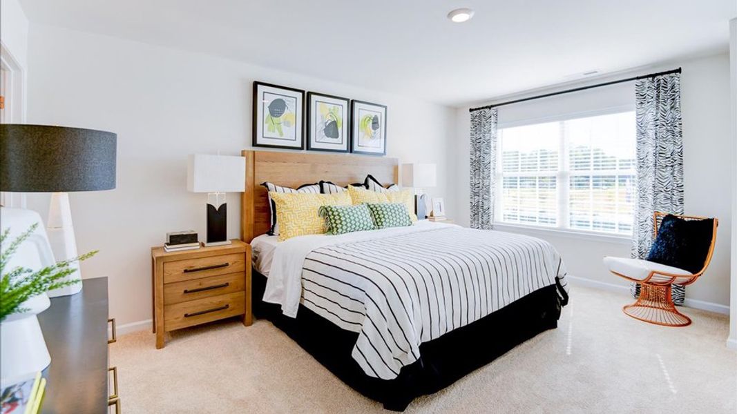 Furnished interior in a model home at Edinborough Townes in Gibsonville (Image 10).