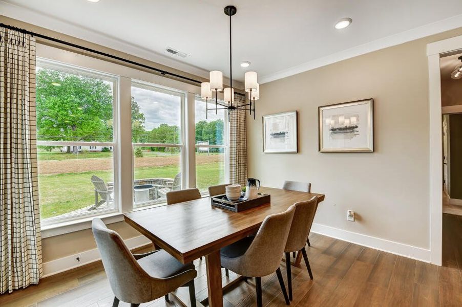 Furnished interior in a model home at Twin Creek Forsyth in Kernersville (Image 30).