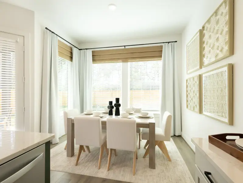 Furnished interior in a model home at Bridge Creek Village - Luxe Series in Cypress (Image 4).