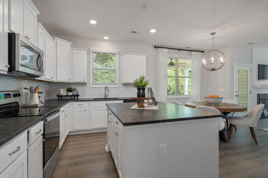 Furnished interior in a model home at Coastal Haven in Leland (Image 20).