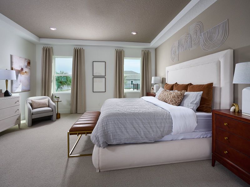 Primary bedroom modeled at Legends Preserve Primary bedroom modeled at Legends Preserve