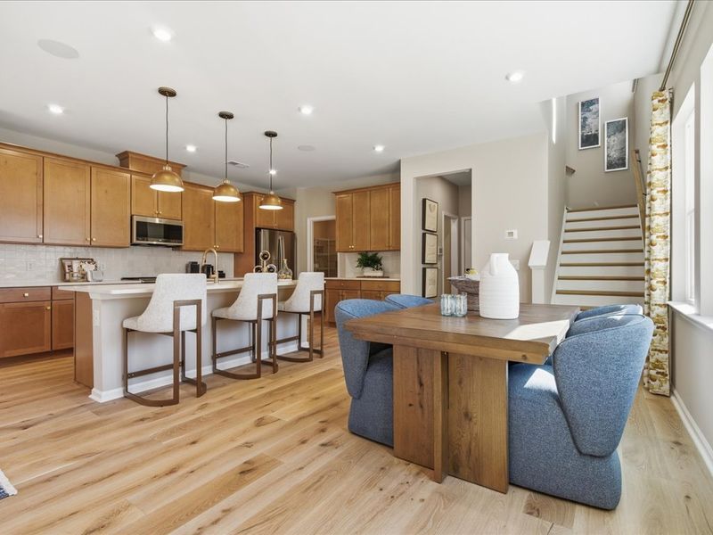 Furnished interior in a model home at Ellis Townes in Charlotte (Image 22).