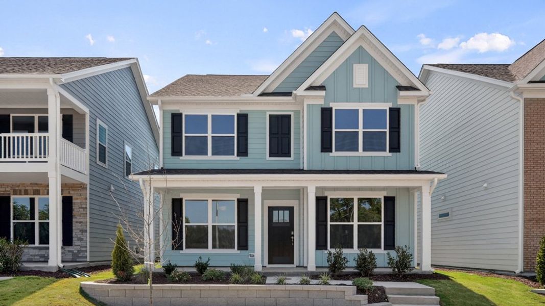 Front exterior of a home in the Madden West community, located in Fuquay Varina, NC (Image 4). Front exterior of a home in the Madden West community, located in Fuquay Varina, NC (Image 4).
