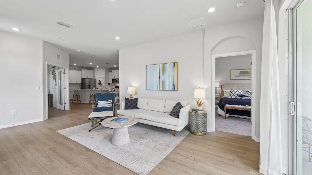 Furnished interior in a model home at Gladstone Park Villas in Sarasota (Image 14).